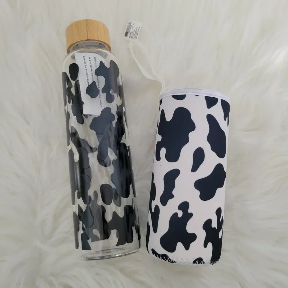 Claire's Cow Print Glass Water Bottle with Sleeve